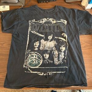 Heavily Worn Led Zeppelin T-shirt. Holes on the bottom. Looks awesome. Pit worn.